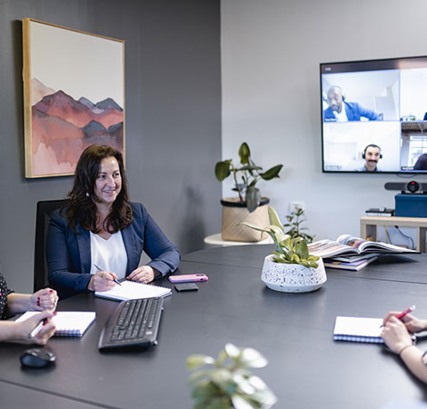 Geological database hosting consultants in a meeting.